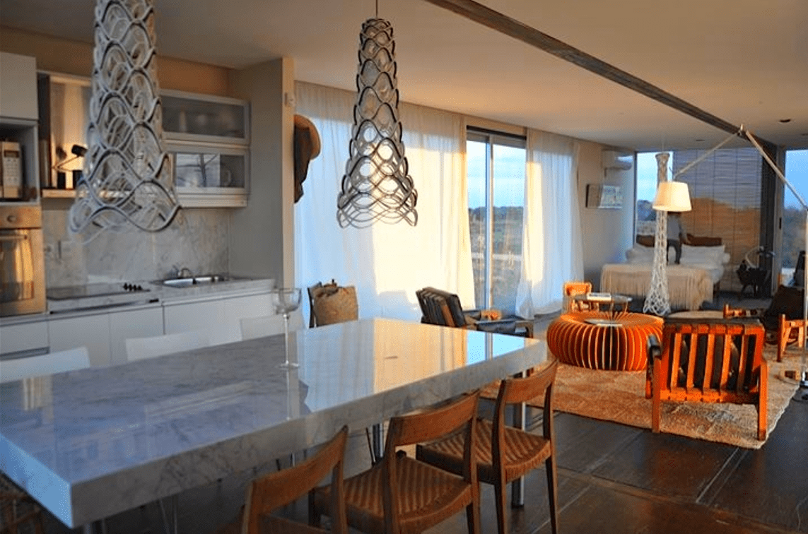 The interiors of capsule container houses often feature a minimalist design, maximizing space and functionality. Open-concept layouts, abundant natural light, and smart storage solutions create a sense of spaciousness. Modern amenities, such as sleek kitchens and contemporary bathrooms, enhance the living experience, while sustainable materials and energy-efficient systems contribute to eco-friendly living. The unique architectural character of container living is celebrated through thoughtful design choices, resulting in inviting and comfortable spaces.